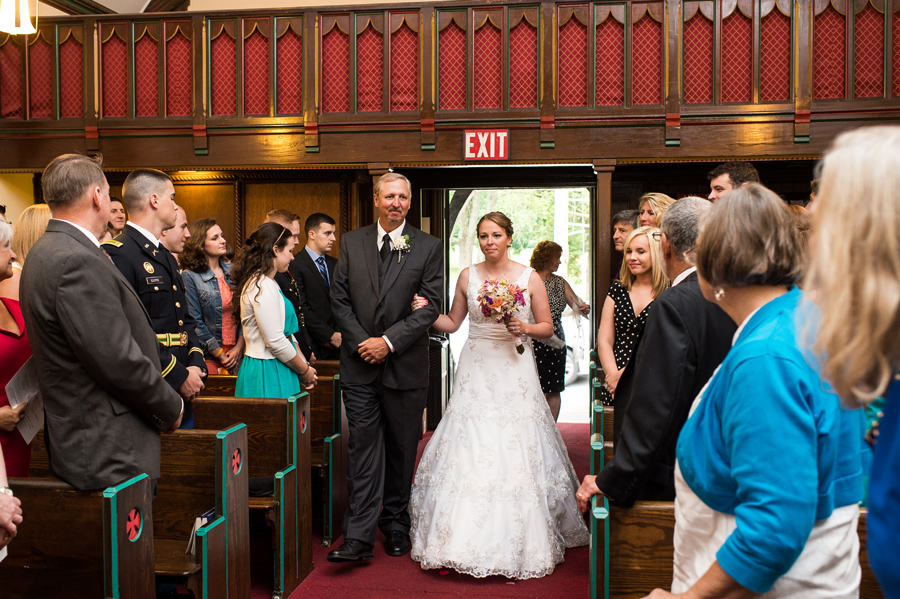 Father walks bride down aisle