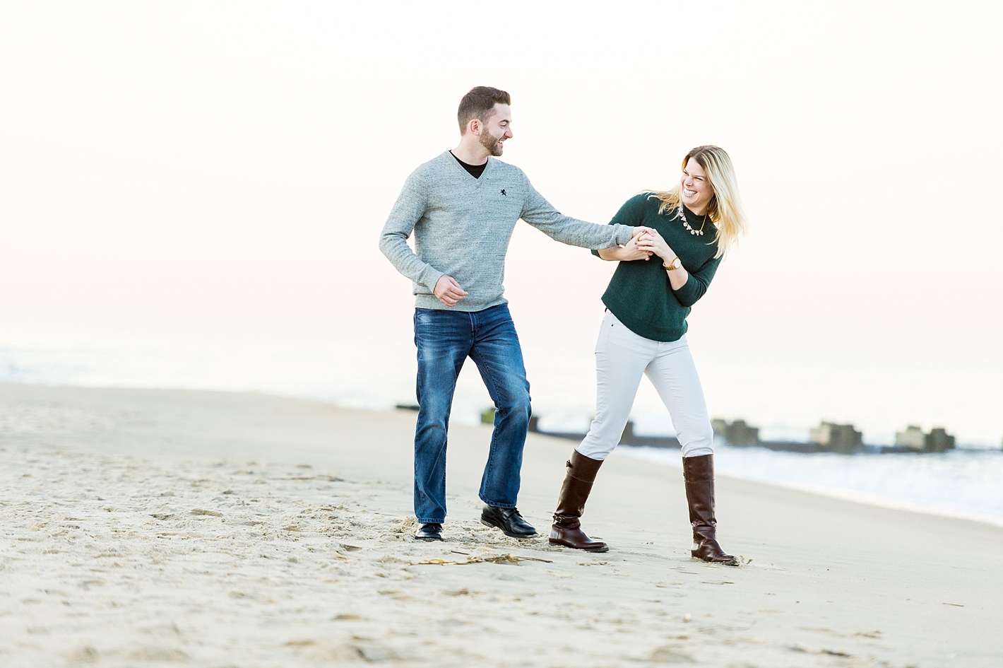 Fun engagement photos on the beach