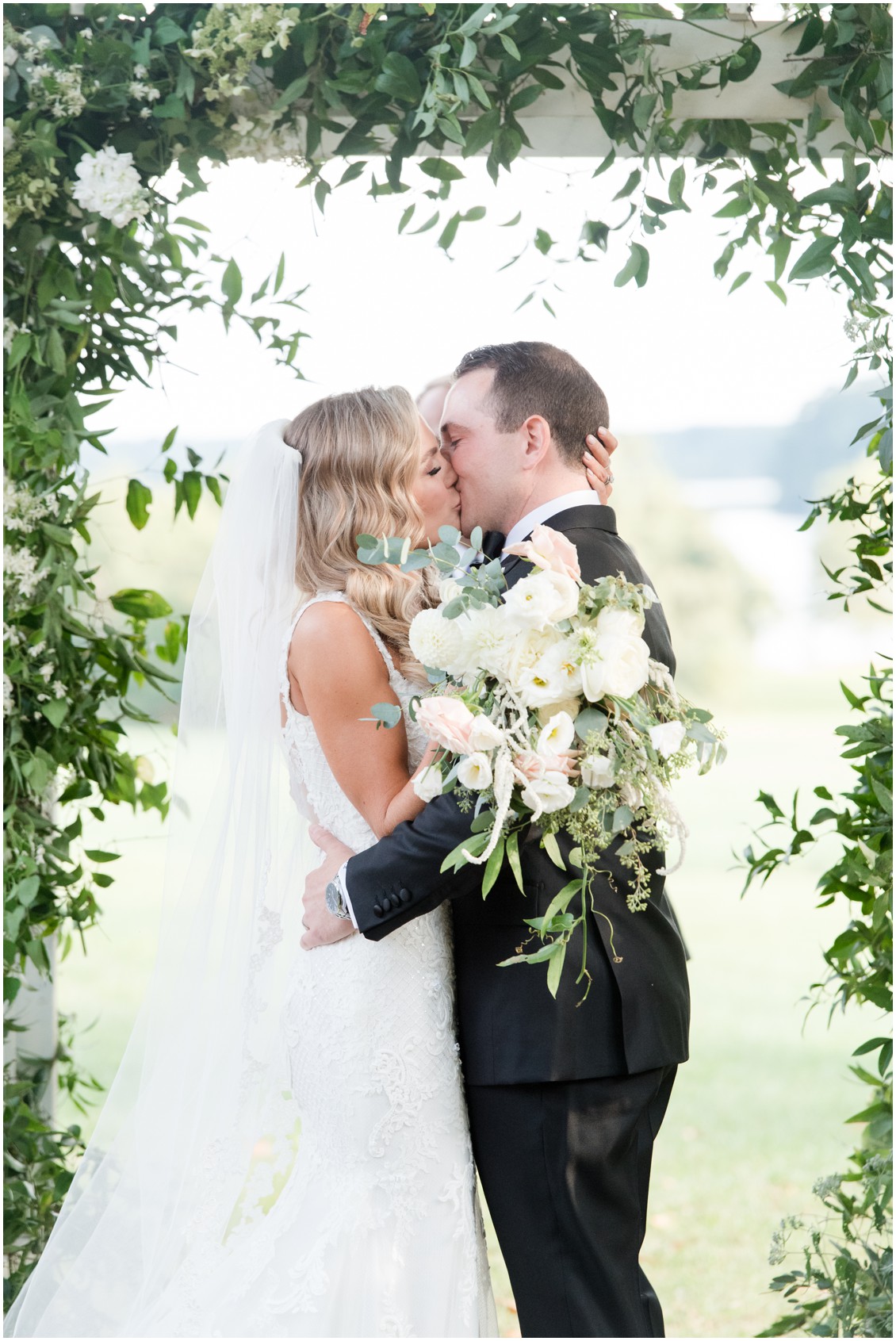 Bride and groom first kiss | Brittland Manor | Rob Korb | My Eastern Shore Wedding 