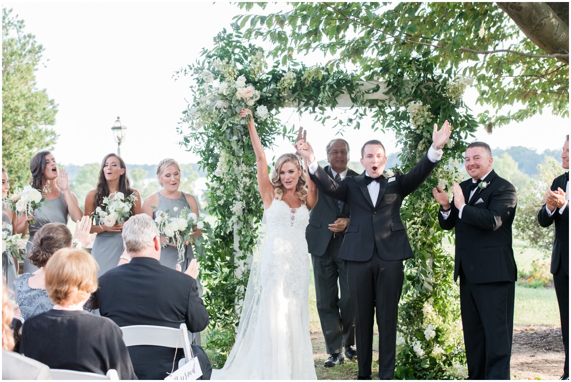 Bride and groom celebrating after ceremony | Brittland Manor | Rob Korb | My Eastern Shore Wedding 